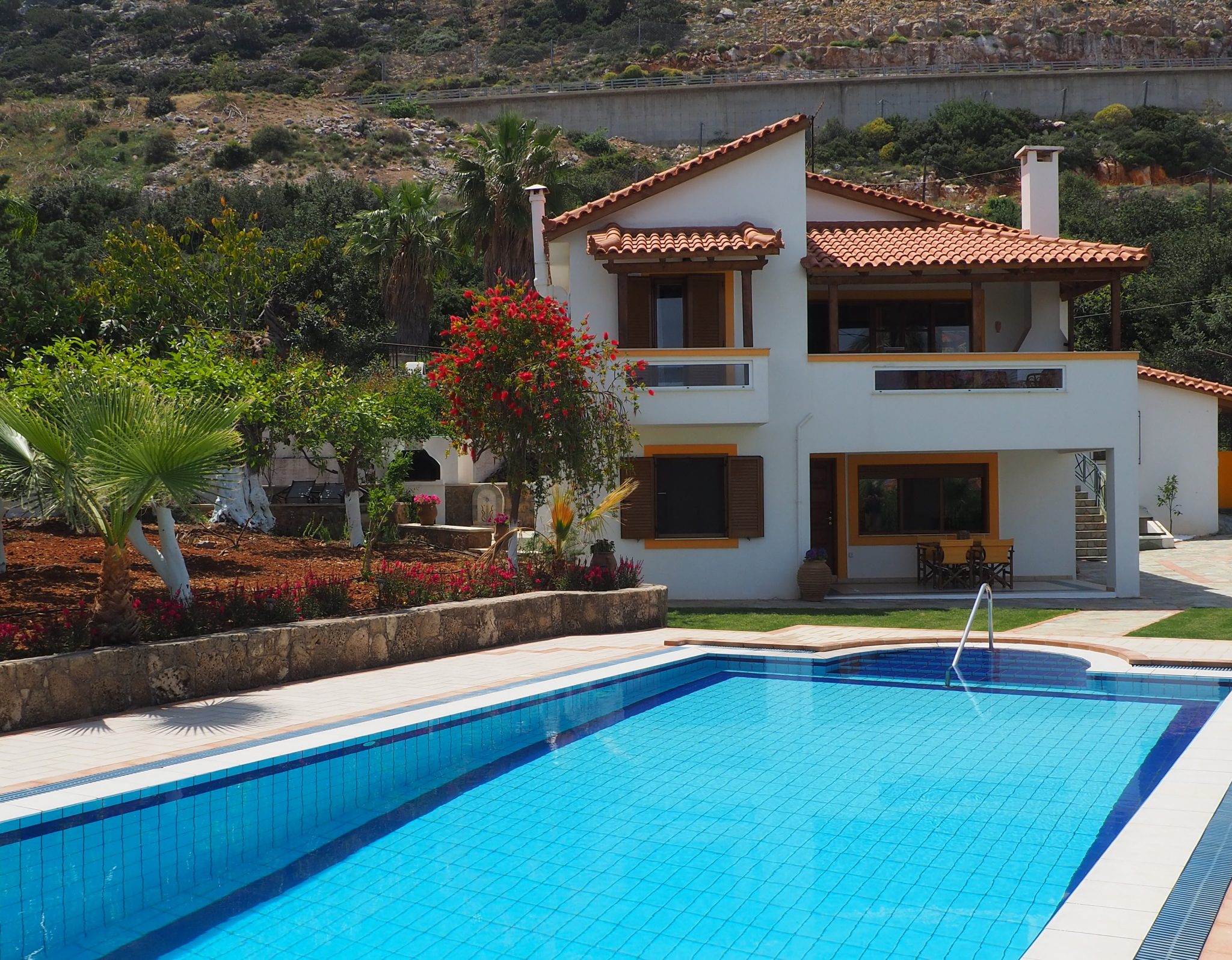 View of Villa Lemonia over the 
large swimming pool